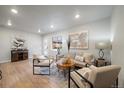 Light and airy living room with hardwood floors and stylish decor at 3738 N Eliot St # 9, Denver, CO 80211