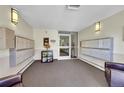 Building lobby with mailboxes and seating area at 635 S Alton Way # 6A, Denver, CO 80247