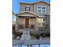 Two-story home with attached garage and front porch at 21953 E Quincy Cir, Aurora, CO 80015