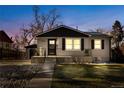 Attractive nighttime view of updated Ranch home with well-lit exterior at 3939 S Huron St, Englewood, CO 80110