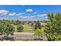 Community view showing green spaces and residential homes at 1801 S Dunkirk St # 303, Aurora, CO 80017