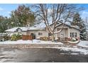 Exterior of the home showing a cozy townhome with a snowy front yard at 2951 S Walden Ct, Aurora, CO 80013