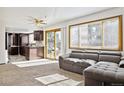 Living room with open layout to kitchen at 5895 S Killarney Way, Centennial, CO 80015