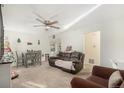 Bright living room with a comfy couch and dining area at 1343 Havana St, Aurora, CO 80010