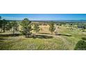 Elevated view of residential lots with mountain views at 8830 Witez Ct, Parker, CO 80134