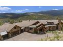 Luxury home with mountain views and expansive property at 456 Crystal Ridge Rd, Evergreen, CO 80439