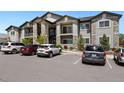 Modern apartment building with ample parking at 875 E 78Th Ave # 53, Denver, CO 80229