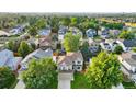 Aerial view of the house and surrounding neighborhood at 5149 Dakota Ave, Castle Rock, CO 80104