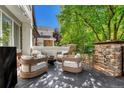 Relaxing patio with seating area and fire pit at 538 Madison St, Denver, CO 80206