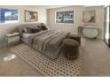 Bright bedroom with large windows and ample space for furniture at 10243 E Peakview Ave # A103, Englewood, CO 80111