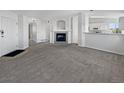 Spacious living room with fireplace and carpet at 6850 Xavier Cir # 12, Westminster, CO 80030