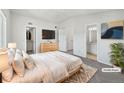 Virtually staged main bedroom with ensuite bathroom at 6850 Xavier Cir # 12, Westminster, CO 80030