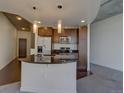 Modern kitchen with island and stainless steel appliances at 891 14Th St # 1612, Denver, CO 80202