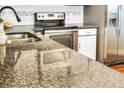 Close up of granite countertop in the kitchen at 14152 E Linvale Pl # 605, Aurora, CO 80014