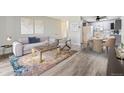 Living and dining area with modern furniture and decor at 9315 E Center Ave # 11A, Denver, CO 80247