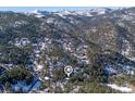 Aerial view of property and surrounding mountainous area at 746 Bow Mountain Rd, Boulder, CO 80304