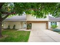 Front view of a two-story townhome with a garage at 4505 S Yosemite S St # 371, Denver, CO 80237