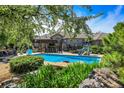 Inviting pool and patio area, perfect for relaxation and entertaining at 9022 Jason Ct, Boulder, CO 80303