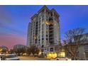 High-rise building exterior, showcasing architectural details and city views at dusk at 1827 N Grant St # 1000, Denver, CO 80203