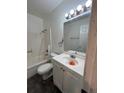 Clean bathroom with a bathtub, toilet, and vanity at 10732 E Exposition Ave # 222, Aurora, CO 80012