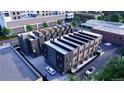 An aerial view of a modern townhome complex with rooftop decks at 1652 N Lafayette St # 1, Denver, CO 80218