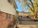 Covered patio area accessible from the back of the house at 813 W Geddes Cir, Littleton, CO 80120