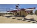 Baseball field concession stand with a covered area and seating at 24786 E Evans Dr, Aurora, CO 80018