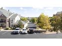 View of the parking lot and surrounding townhouses at 18989 E Warren # G202, Aurora, CO 80013