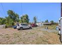 Additional street view showing parking and yard at 8201 W 51St Ave, Arvada, CO 80002