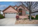 Beautiful two-story home with attached garage and landscaping at 8106 S Albion St, Centennial, CO 80122