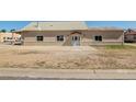 Commercial building with stone accents and covered porch at 627 Main St, Platteville, CO 80651