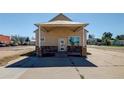 Commercial building with stone accents and covered porch at 627 Main St, Platteville, CO 80651