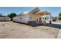 Commercial building with stone accents and covered porch at 627 Main St, Platteville, CO 80651