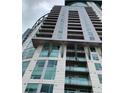 Modern high rise building, close-up view showcasing architectural details at 2001 Lincoln St # 1910, Denver, CO 80202