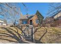 Attractive brick home with lush landscaping and a welcoming front entrance at 1400 S Vine St, Denver, CO 80210