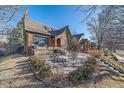 Cozy brick patio with seating area, perfect for outdoor relaxation at 1400 S Vine St, Denver, CO 80210