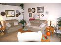 Living room with two sofas, a coffee table, and autumn decorations at 535 Pine St, Frederick, CO 80530