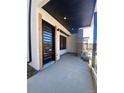 Stylish front entrance with a modern black door at 1254 Yates St, Denver, CO 80204