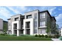 Modern three-story building with light-grey and white exterior and landscaping at 11930 Soprano Cir # 203, Lone Tree, CO 80134