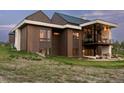 Contemporary home with expansive back deck and stunning views at 11229 Running Kit Pl, Franktown, CO 80116