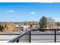 Relax on your private rooftop deck overlooking the city skyline at 1420 Pierce St, Lakewood, CO 80214