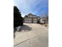 Two-story house with three-car garage at 24456 E Louisiana Cir, Aurora, CO 80018