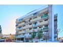 Front view of a multi-story apartment building at 799 Dahlia St # 501, Denver, CO 80220