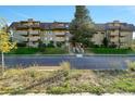 Attractive exterior of a multi-unit building with landscaping at 3240 Iris Ave # G201, Boulder, CO 80301