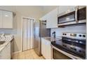 Modern kitchen with stainless steel appliances and granite countertops at 4274 S Salida Way # 11, Aurora, CO 80013