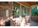 Brick facade with porch and classic windows at 801 S Downing St, Denver, CO 80209