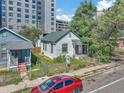 Street view of a house for sale among other buildings at 3735 N Marion St, Denver, CO 80205