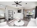 Open concept dining area with modern decor and a round table at 1677 S Buckley Cir, Aurora, CO 80017