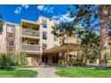 Exterior view of the apartment building with landscaping at 1304 S Parker Rd # 155, Denver, CO 80231