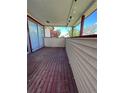 Wooden deck with sliding glass doors at 2125 S Telluride Ct, Aurora, CO 80013